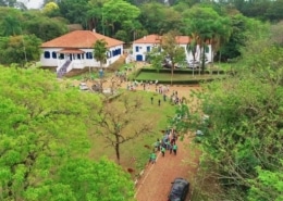 Aerial photo of the Paulinia site with people gathered outside.